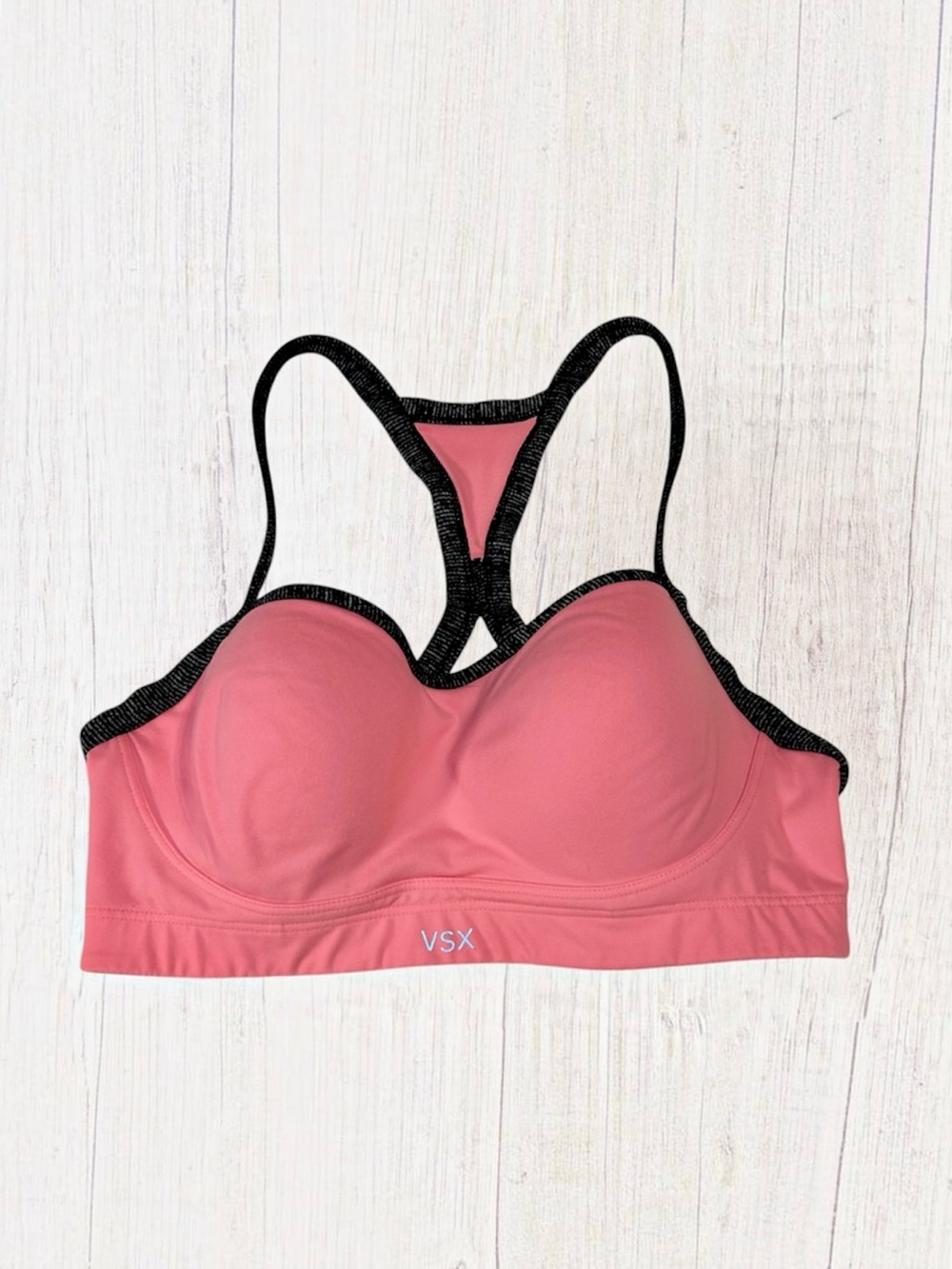 VSX Sport Pink Racerback Sports Bra with Black Trim. Size 32D